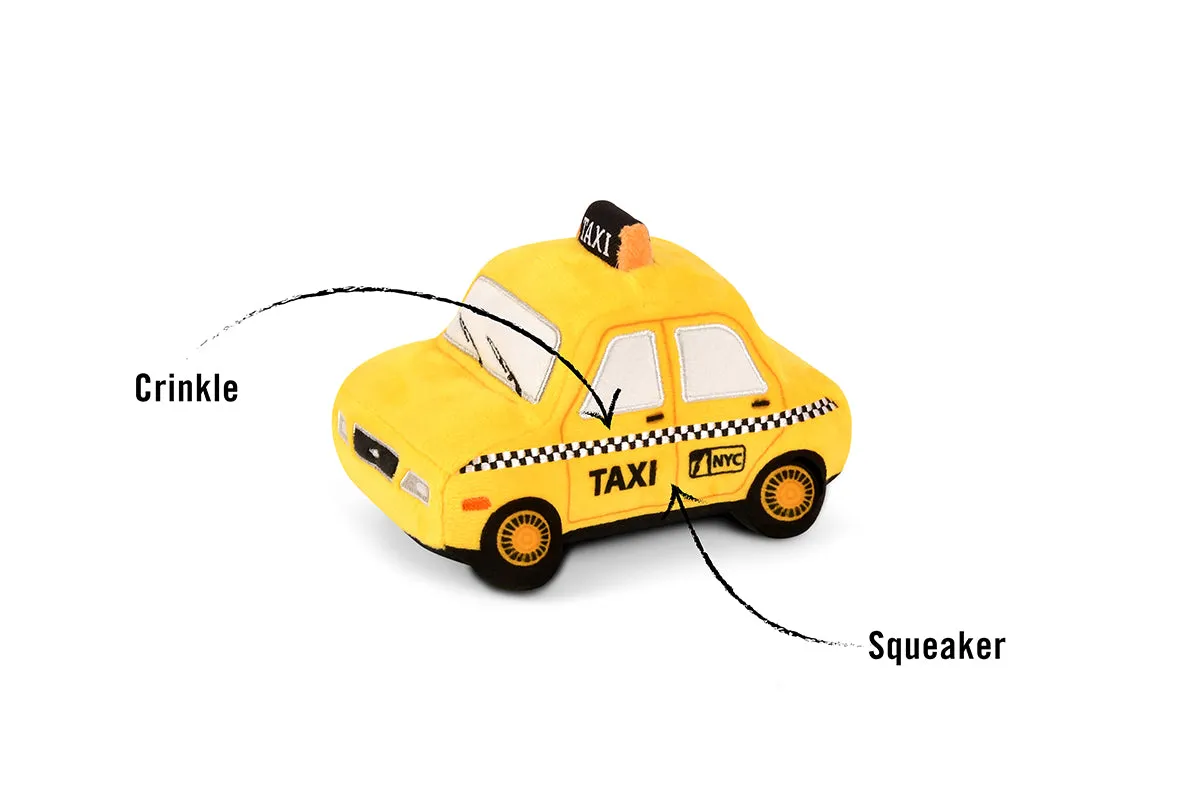 P.L.A.Y. Canine Commute New Yap City Taxi hundleksak gul mjuk